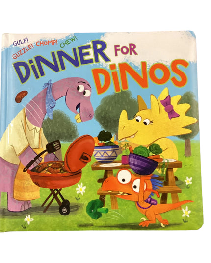 Children's book titled 'Dinner for Dinos' on a wooden surface