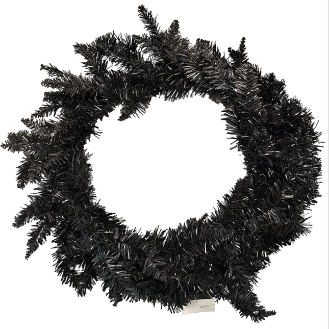Black tinsel wreath on a white background

